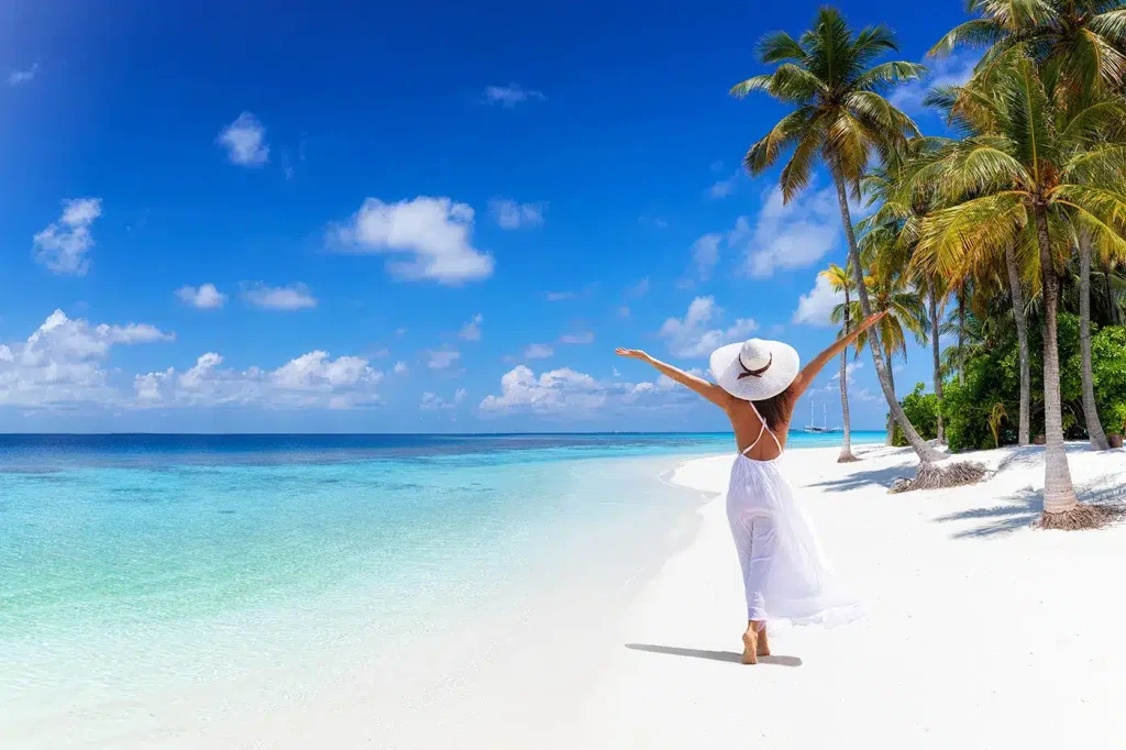 6 Days Zanzibar Getaway-tourist-on-the-white-sandy-beach-of-Zanzibar-